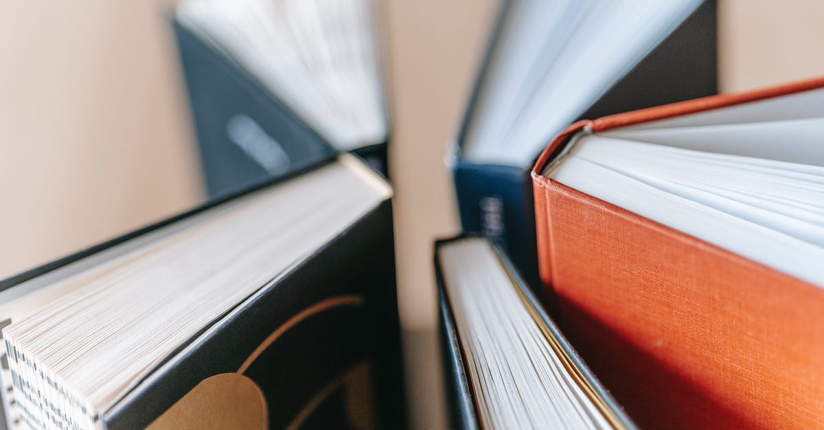 Can I get science from asteroids? - From above of various books with hardcovers placed on wooden table in daylight Can I get science from asteroids? - From above of various books with hardcovers placed on wooden table in daylight