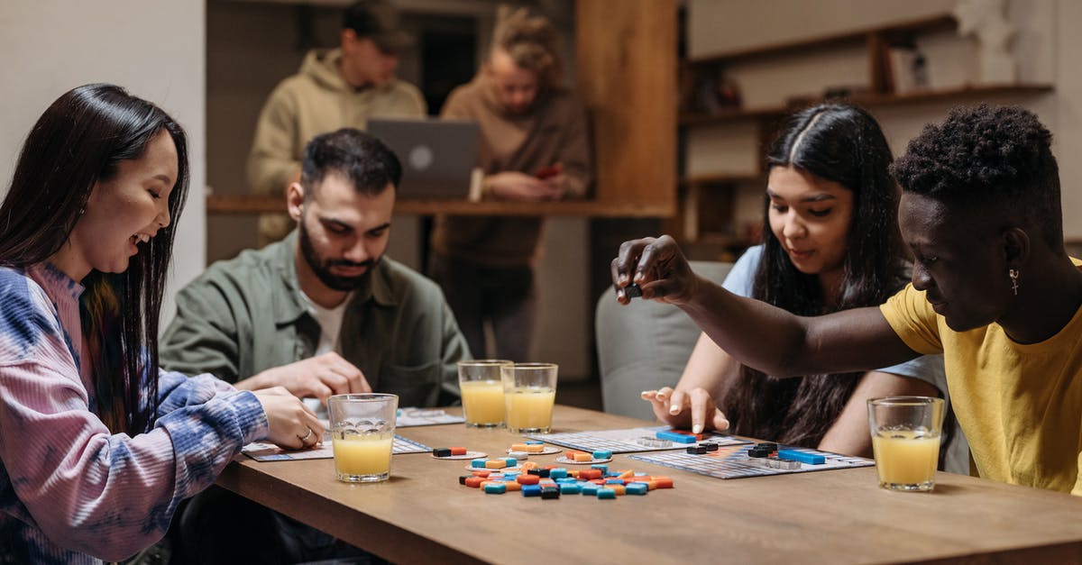 Can I keep playing after the final quest on Fallout 1? - A Group of People Playing Board Game Can I keep playing after the final quest on Fallout 1? - A Group of People Playing Board Game