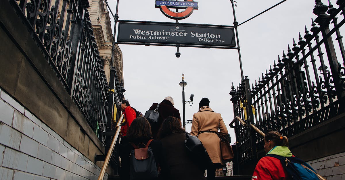 Can I leave some loot in "flashback" to pick up in current timeline? - People leaving underground station in city