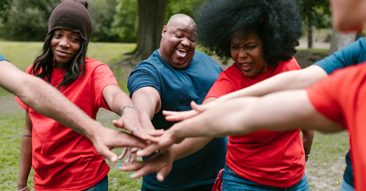 Can I lend my games to friends? - Group of People Playing Outdoors