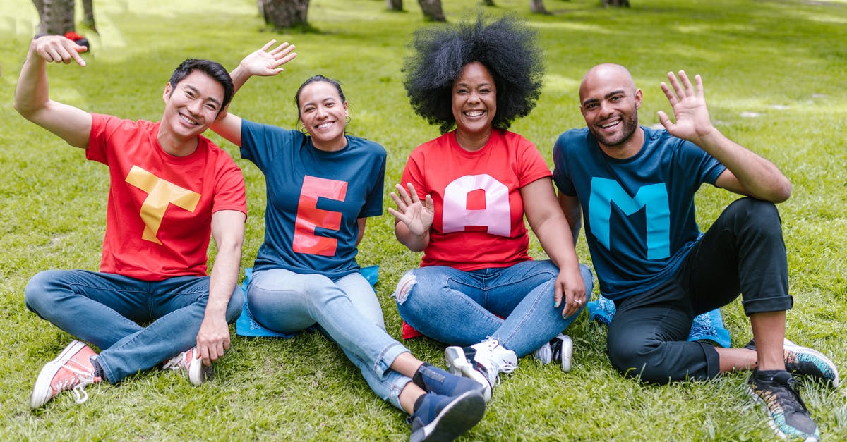 Can I lend my games to friends? - People Sitting on Green Grass Waving Their Hands