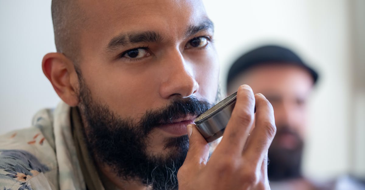 Can I look up in a car? - A Man Holding a Canister
