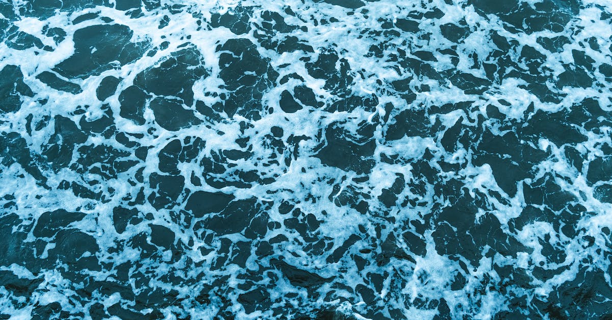 Can I move my downloaded Origin games to another location without reinstalling them? - Background of foamy waving blue sea water