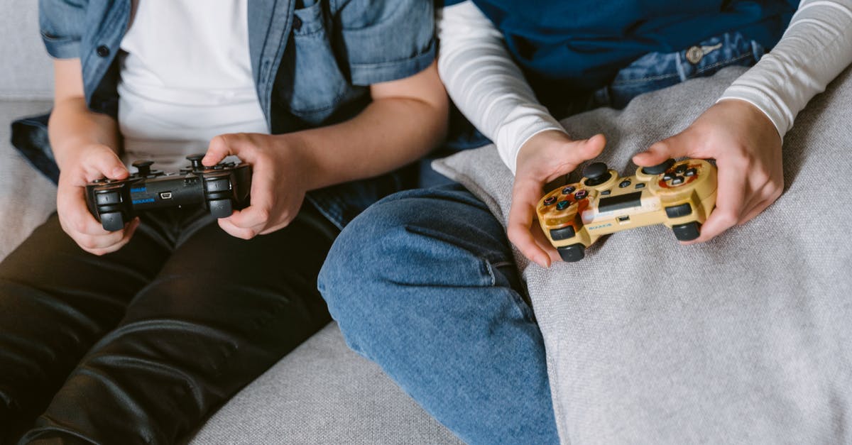 Can I play Call of Duty: Modern Warfare 3 on my PC with people playing on macs? - Person in White Long Sleeve Shirt and Blue Denim Jeans Holding Brown and Black Toy Gun