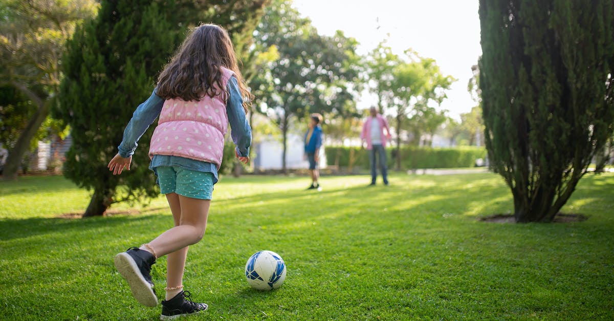 Can I play multiplayer? - Girl in Blue Denim Shorts Playing Soccer Can I play multiplayer? - Girl in Blue Denim Shorts Playing Soccer