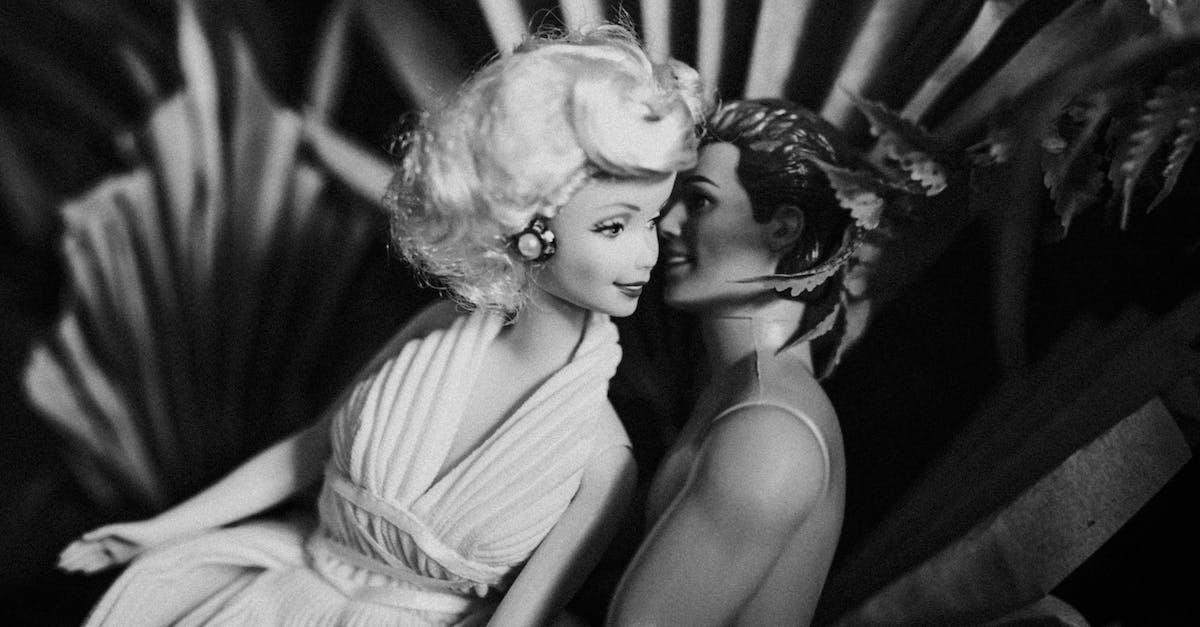 Can I play on my PS4 while my girlfriend plays on PS Vita? - Loving couple of dolls sitting close against plants Can I play on my PS4 while my girlfriend plays on PS Vita? - Loving couple of dolls sitting close against plants