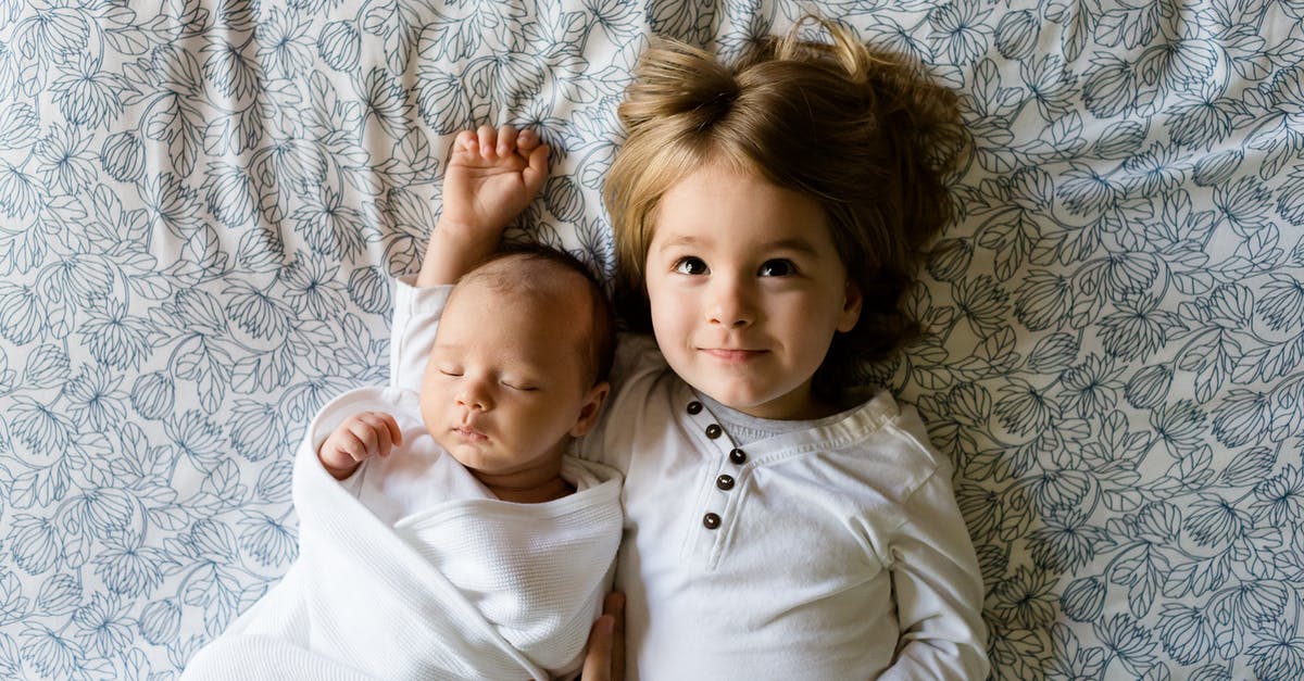 Can I pull two tethered objects together? - Baby Sleeping Beside Girl on Gray Floral Textile Can I pull two tethered objects together? - Baby Sleeping Beside Girl on Gray Floral Textile