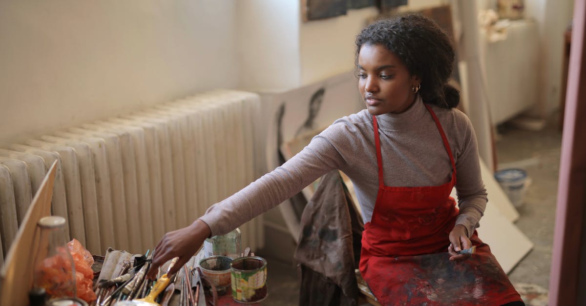 Can I put black paint on a cow mangler? - Young female artist working in studio