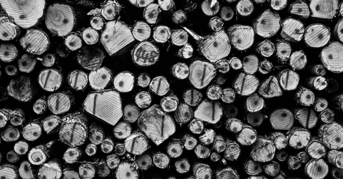Can I stack items like Gravitrino balls? - Grayscale Photography of Wirewood Logs