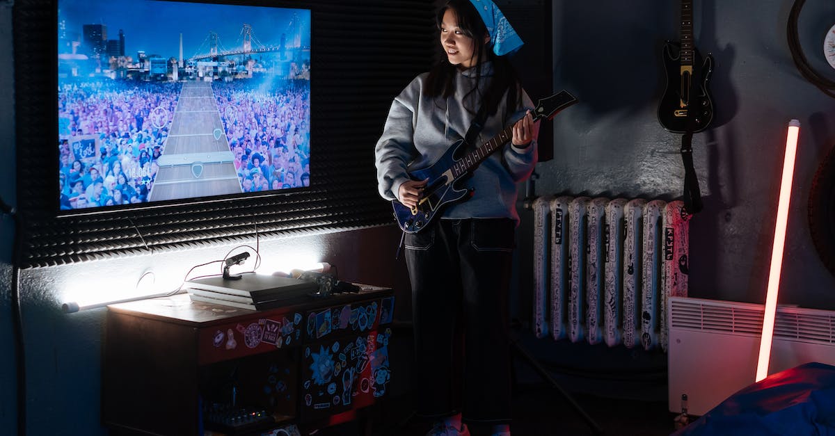 Can I sync a Guitar Hero World Tour controller dongle with a Guitar Hero 3 guitar? - Free stock photo of active, adult, concert Can I sync a Guitar Hero World Tour controller dongle with a Guitar Hero 3 guitar? - Free stock photo of active, adult, concert