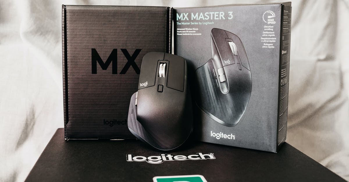 Can I transfer just some game data to a new SD card? - Modern black computer game mouse near box with text of description of functions