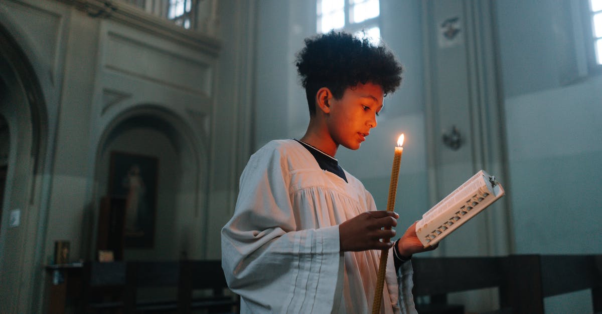 Can I transfer my profile gaming from one profile to a new one? - Person Holding a Book and Lighted Candle