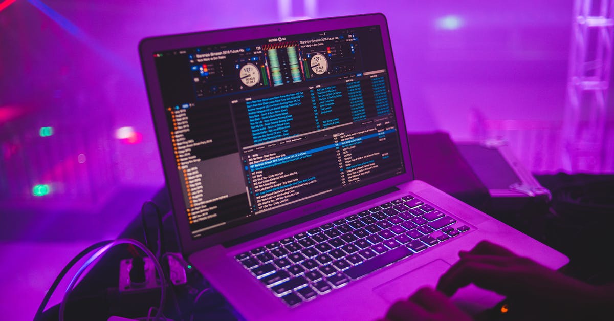 Can I use Dance Central 2 co-op mode with dance central songs? - Crop dj with laptop in club