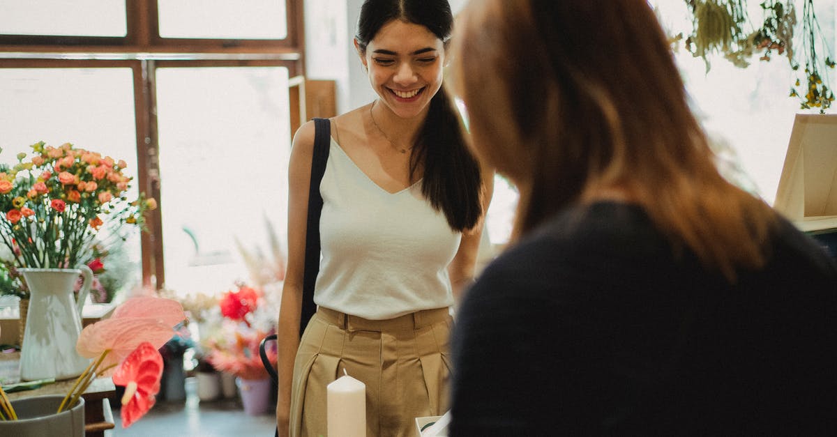 Can I use my Nintendo eShop balance to buy a present for a friend? - Happy woman visiting floral shop and buying bouquet Can I use my Nintendo eShop balance to buy a present for a friend? - Happy woman visiting floral shop and buying bouquet