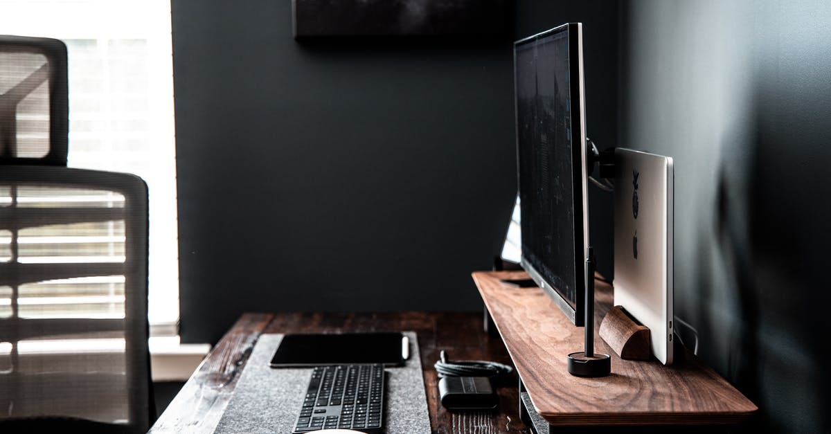 Can I use Pokemon Go while I set mobile data off? - Modern computer monitor with keyboard and tablet in modern room