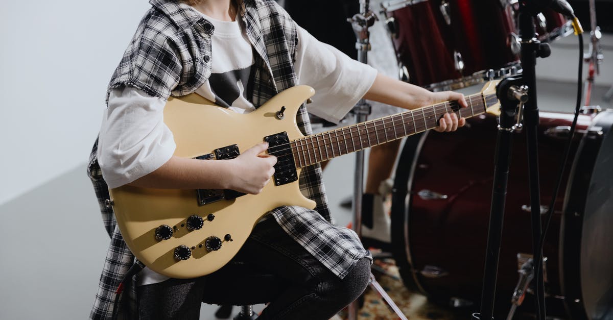 Can I use Rock Band Drums with Guitar Hero World Tour on the Wii? - Free stock photo of anonymous, band, child