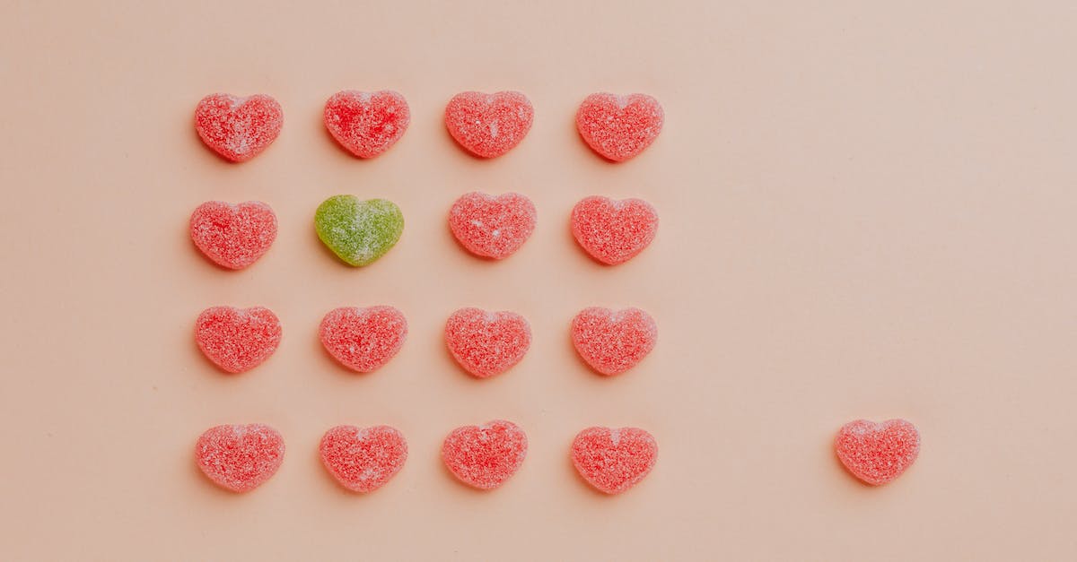 Can I view tags from other languages without switching my store language? - Top view of delicious sprinkled jelly sweets composed in lines with one candy aside on pink backdrop in candy shop Can I view tags from other languages without switching my store language? - Top view of delicious sprinkled jelly sweets composed in lines with one candy aside on pink backdrop in candy shop