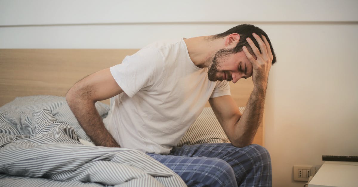 Can Jager's ADS hurt people? - Young man in sleepwear suffering from headache in morning Can Jager's ADS hurt people? - Young man in sleepwear suffering from headache in morning