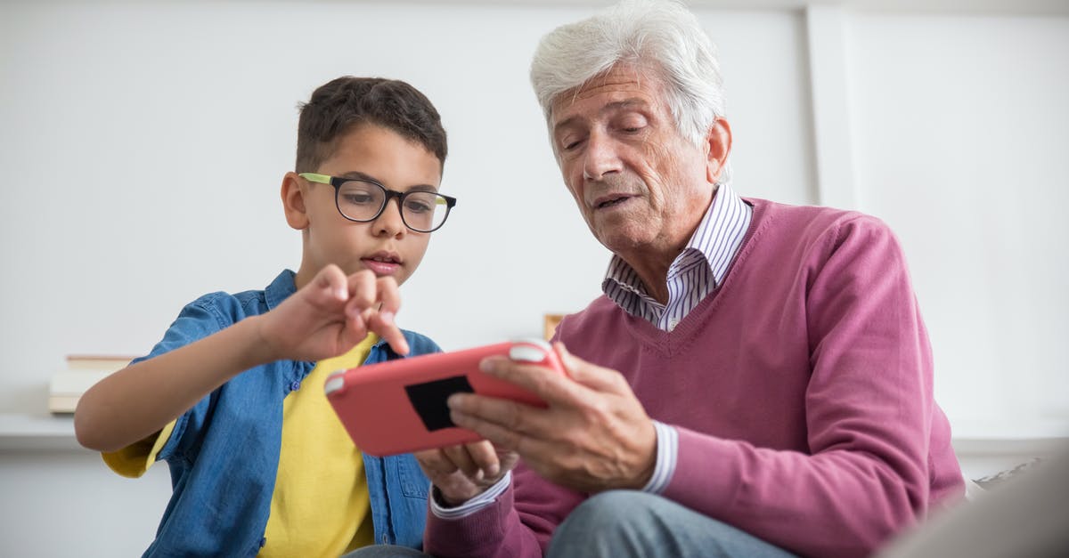 Can my grandson play Minecraft offline? - A Boy Teaching His Grandfather How to Play a Game Console