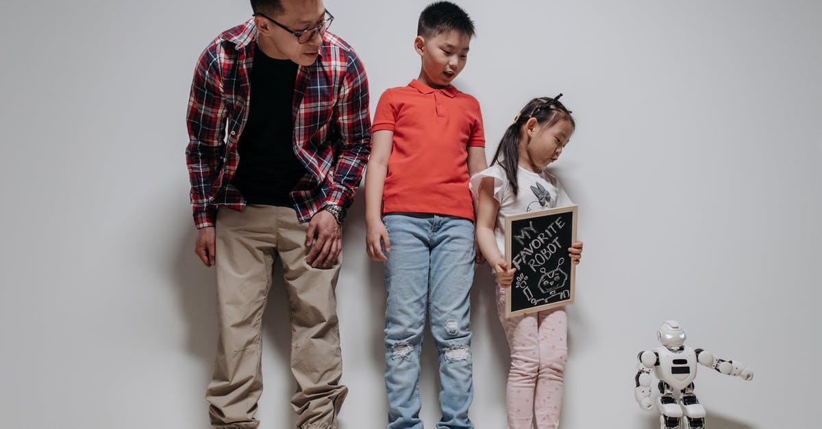 Can my son use my Gmail account for Pokémon Go without his Android accessing my emails? - A Man, Two Children and a White Plastic Toy Robot Standing Against a White Wall