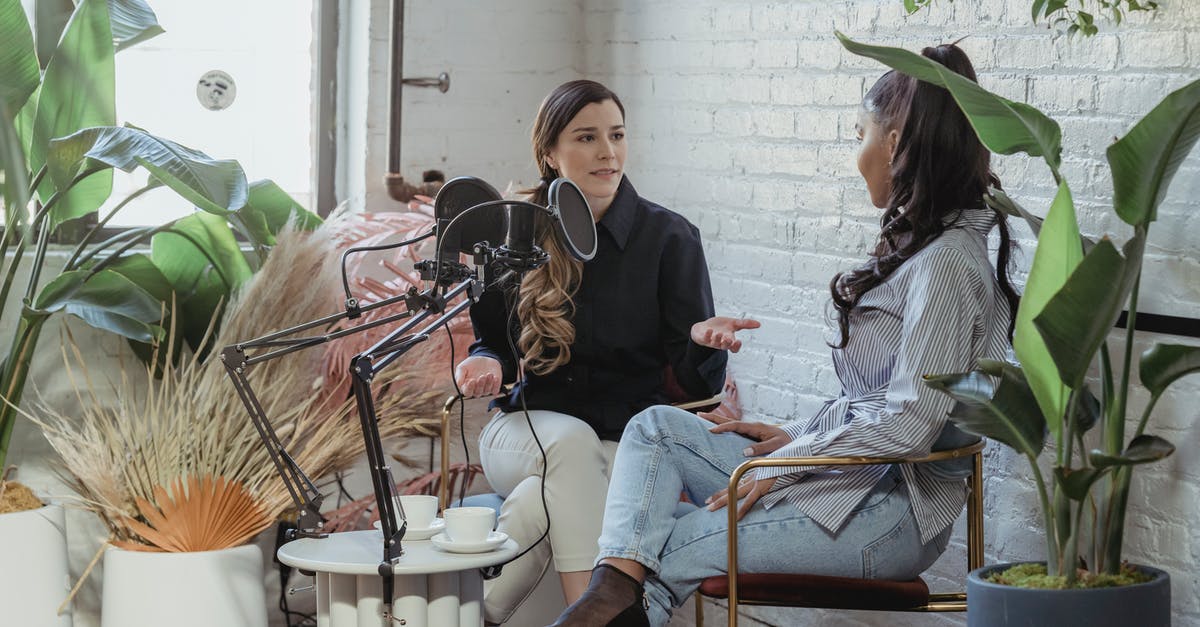 Can only a Minuteman interact with the radio transmitter? - Multiracial trendy women chatting during podcast in studio Can only a Minuteman interact with the radio transmitter? - Multiracial trendy women chatting during podcast in studio