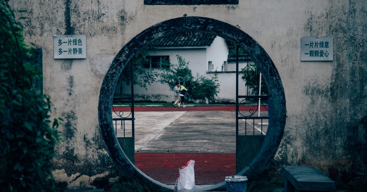 Can psi attack damage be reduced? - Back view of anonymous couple walking near aged house with dirty wall and inscriptions Can psi attack damage be reduced? - Back view of anonymous couple walking near aged house with dirty wall and inscriptions
