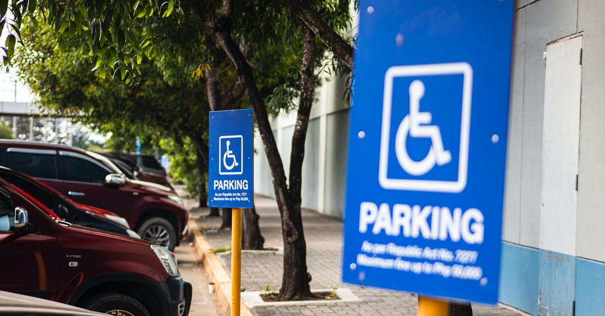 Can the Addons Warning be disabled? - Disabled parking sign on street with transport
