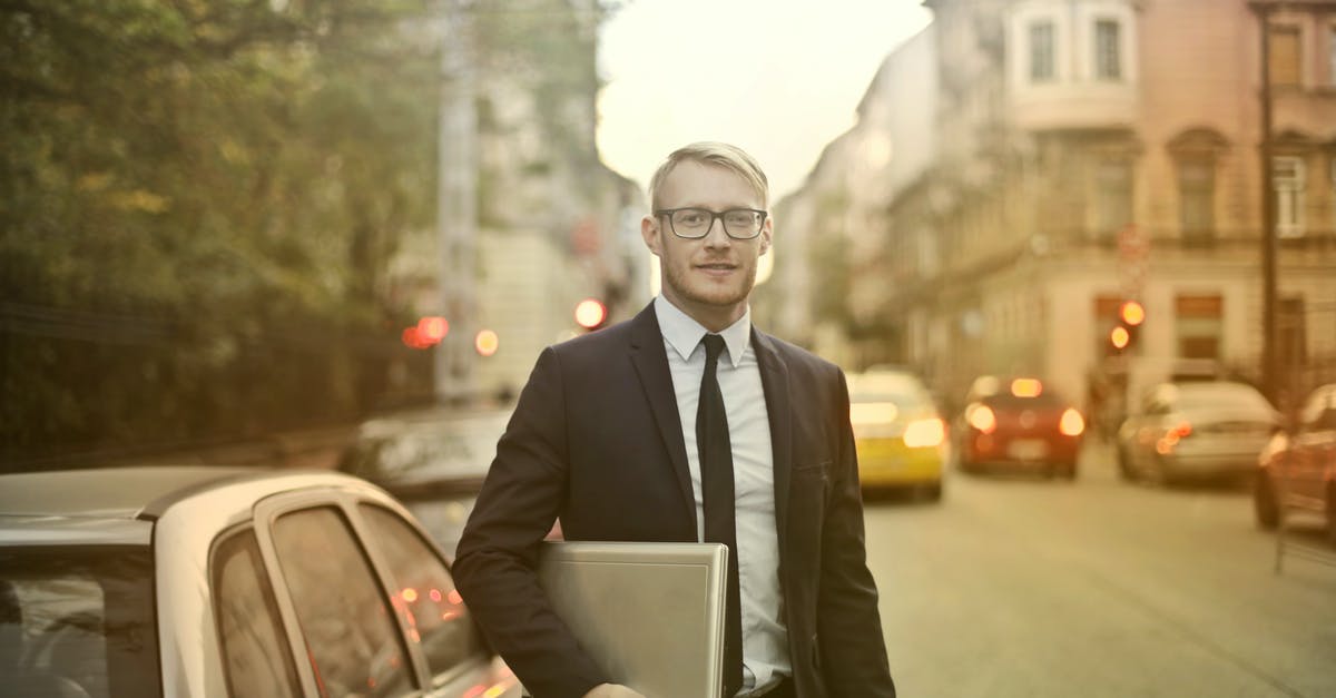 Can the Starlet Sniper outfit be worn by male and female characters? - Determined smiling businessman with laptop on street