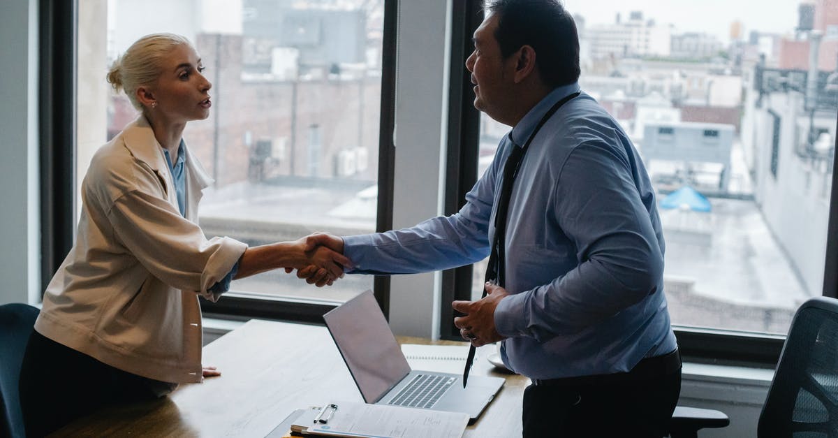 Can the Success Chance be cheesed? - Young woman shaking hands with boss after business presentation