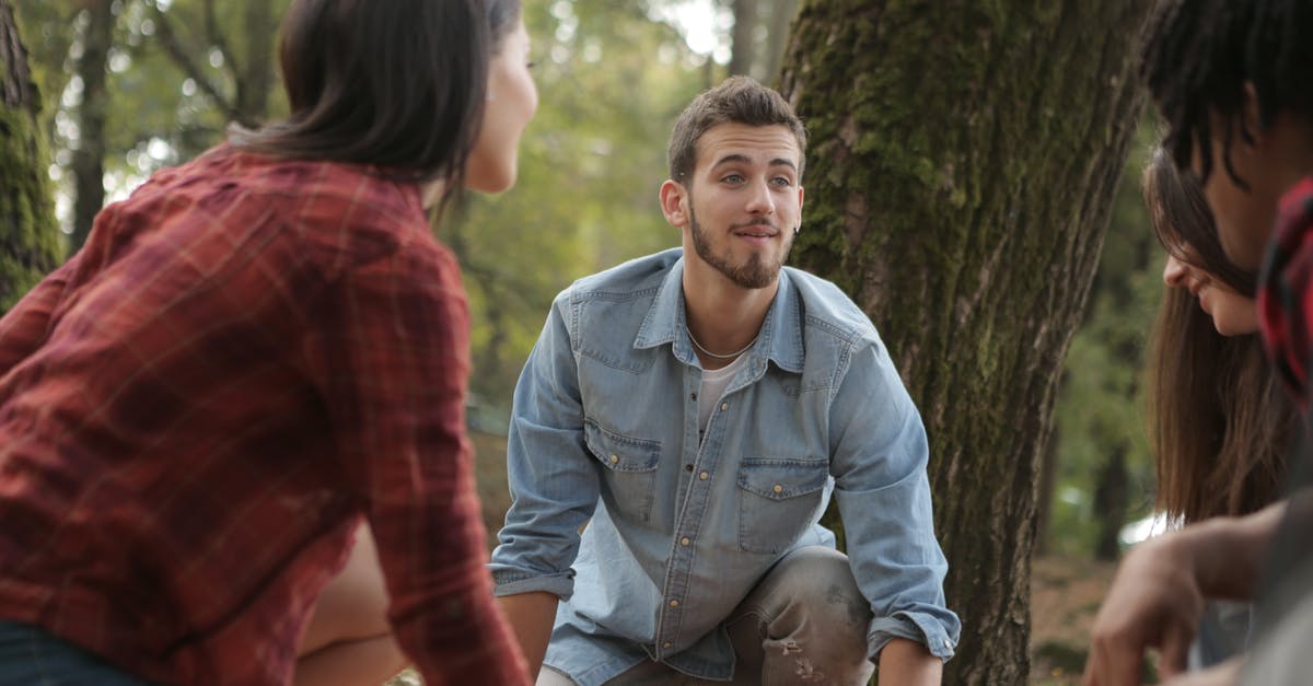 Can two people play each other's shared Steam games? - Happy friends spending time in forest