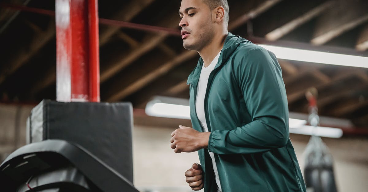 Can two servers run on the same machine? - Serious man running on treadmill and watching on display