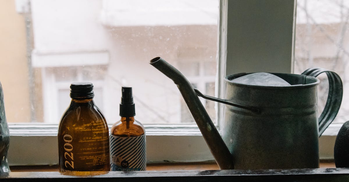 Can underground pools have windows between them and basements? - Black and Brown Plastic Bottle Beside Black Steel Cooking Pot