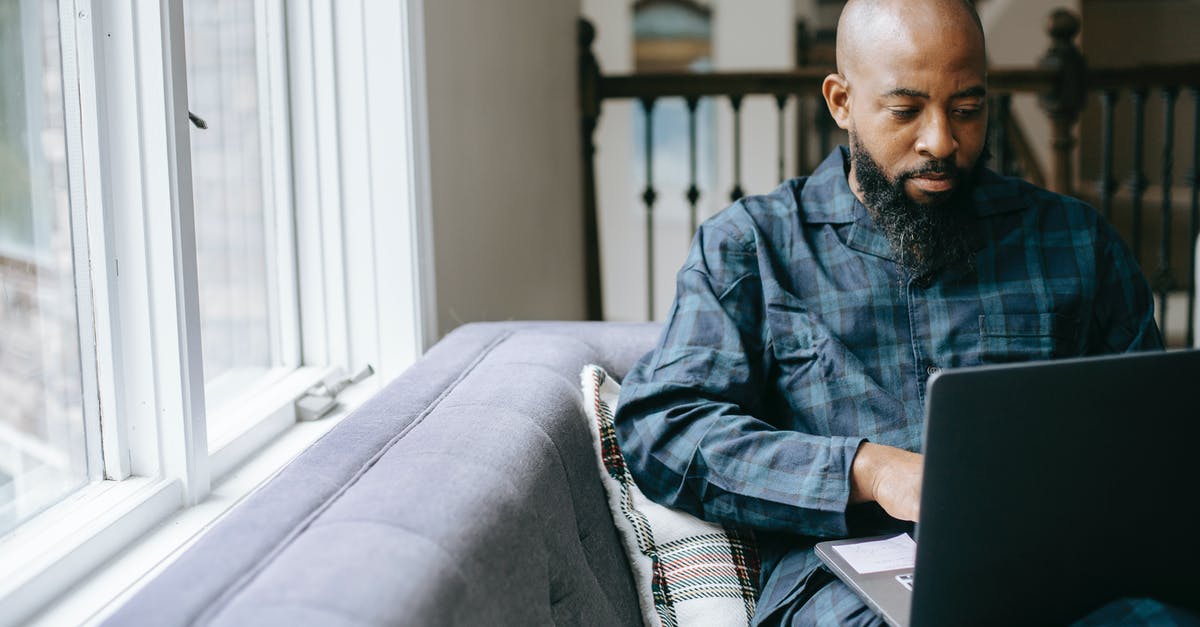 Can we use funneling while using GOwipe? - Serious black man using laptop at home Can we use funneling while using GOwipe? - Serious black man using laptop at home