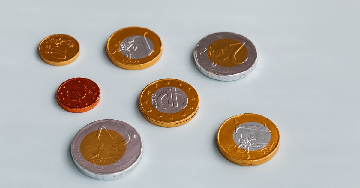 Can you build a monowheel in Little Big Planet? - Chocolate coins on white surface Can you build a monowheel in Little Big Planet? - Chocolate coins on white surface