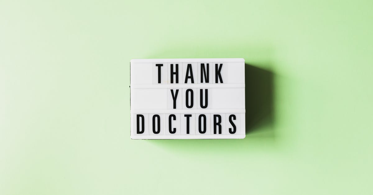 Can you change your boost mid-game? - Top view of retro light box with THANK YOU DOCTORS inscription placed on green surface