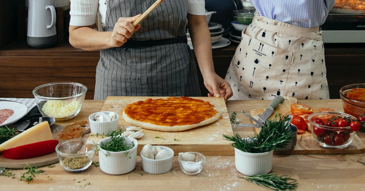 Can you cook raw meat in The Witcher 3 - Crop anonymous female cooks at table with tomato salsa on raw dough near assorted ingredients for pizza in house Can you cook raw meat in The Witcher 3 - Crop anonymous female cooks at table with tomato salsa on raw dough near assorted ingredients for pizza in house