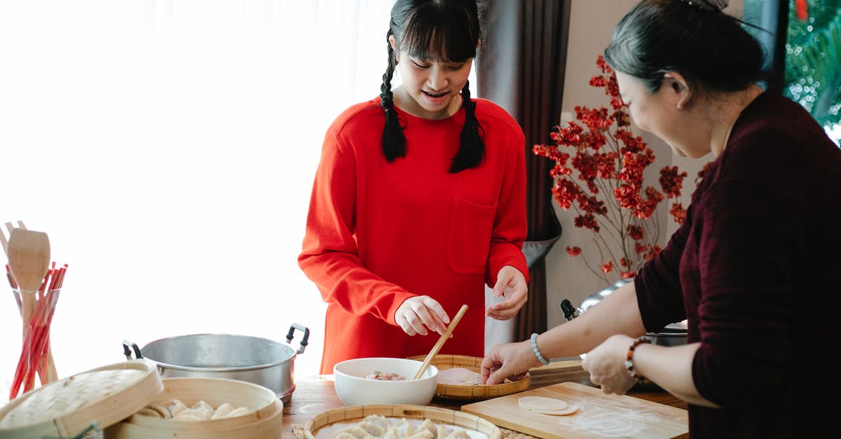 Can you cook raw meat in The Witcher 3 - Smiling ethnic grandma with female teen preparing Chinese dumplings while talking at table with traditional steamers in house Can you cook raw meat in The Witcher 3 - Smiling ethnic grandma with female teen preparing Chinese dumplings while talking at table with traditional steamers in house