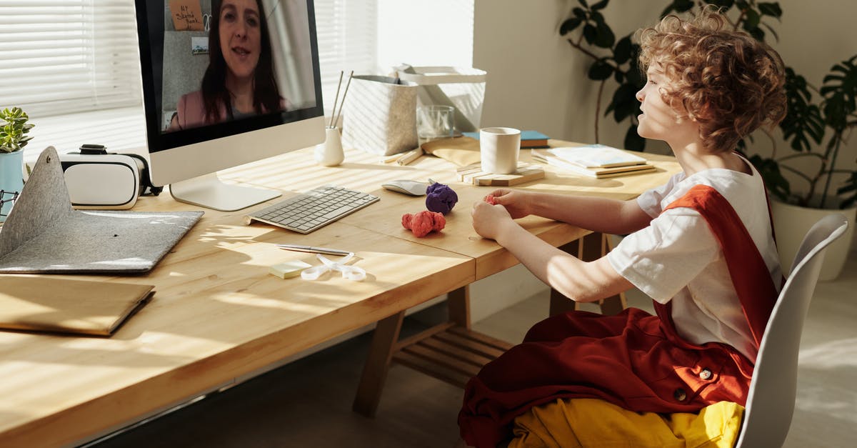 Can you craft watches? - Photo of Child Watching Through Imac