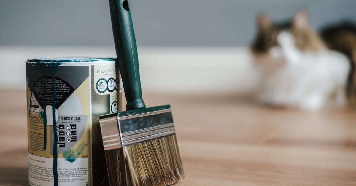 Can you get Painted or Certified items in Rocket League with trade-ins? - Paint brush near can on floor at home Can you get Painted or Certified items in Rocket League with trade-ins? - Paint brush near can on floor at home
