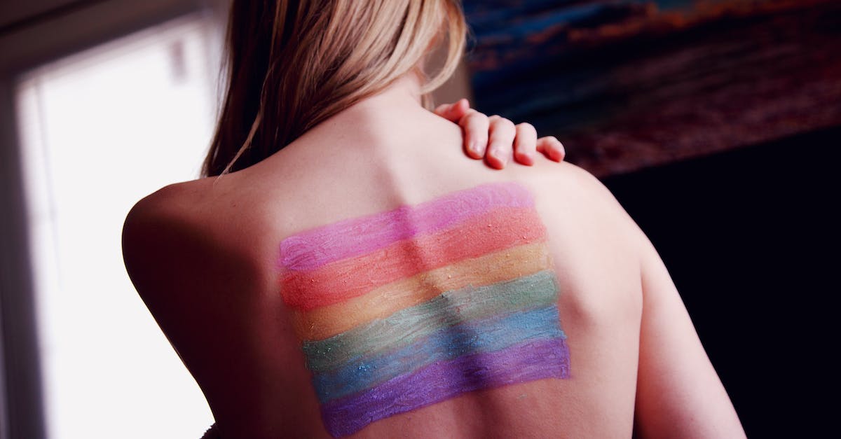 Can you get the rainbow jetpack back? [duplicate] - Woman With a Gay Pride Body Paint on Back