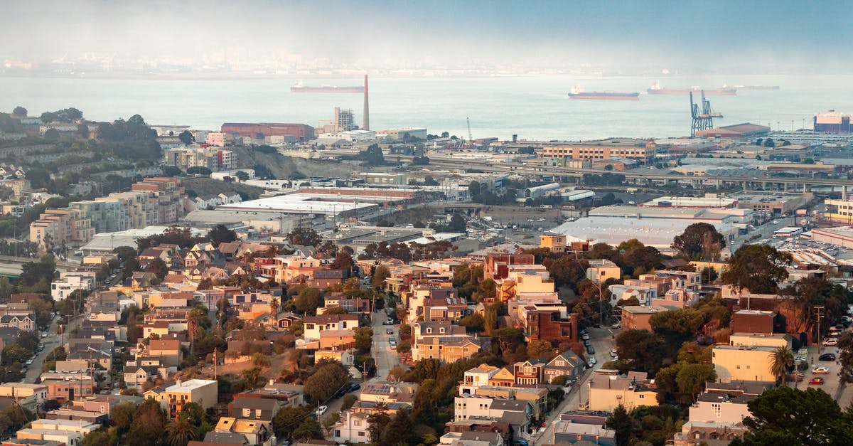 Can you make a city all industry and just ship in workers from another city in SimCity 2013? - Cityscape of coastal city in daytime Can you make a city all industry and just ship in workers from another city in SimCity 2013? - Cityscape of coastal city in daytime
