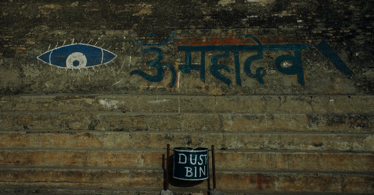 Can you make Ender Crystals do less damage? - Shabby stone wall with eye ornament and Hindi inscription