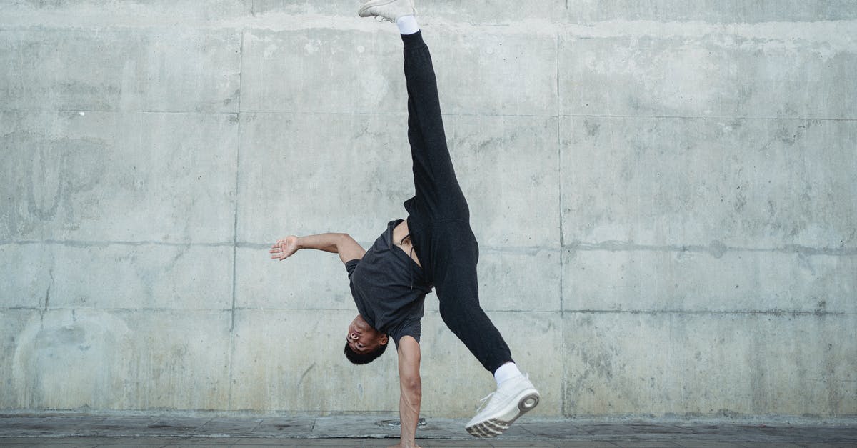 Can you move the position of the Hyperdrive after crafting it - Flexible male dancer in sportswear and white sneakers doing handstand during break dance on urban street