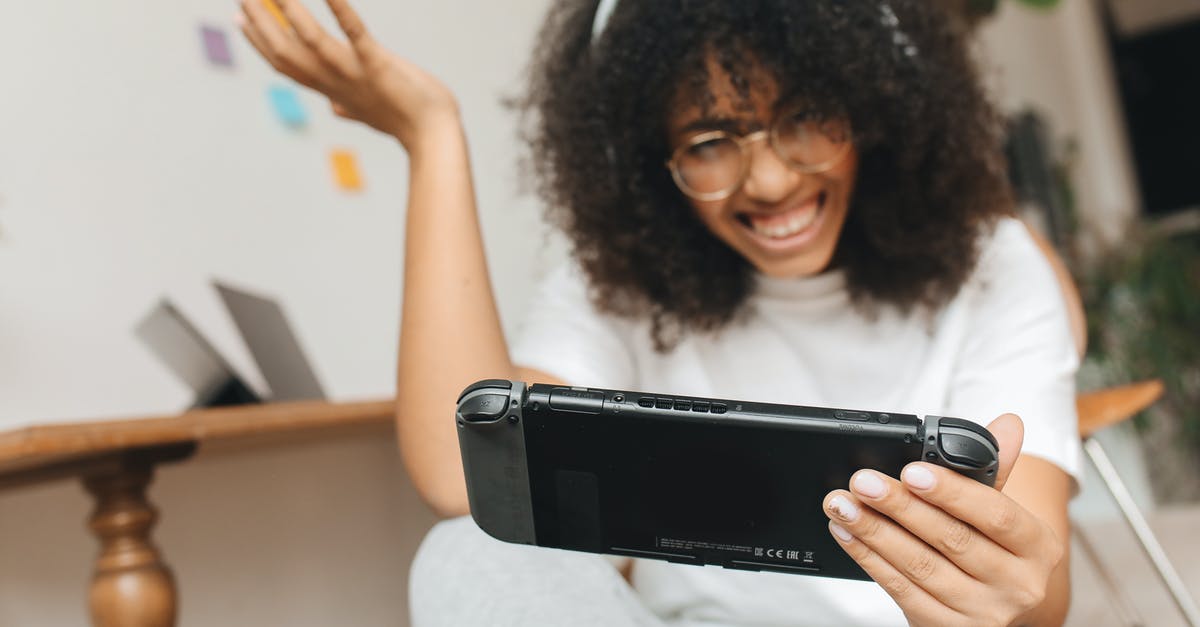 Can you only have 12 games on the switch? - A Woman Playing with a Video Game Console Can you only have 12 games on the switch? - A Woman Playing with a Video Game Console