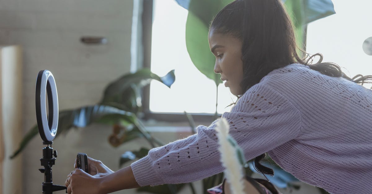 Can you shoot through an enemy Reinhardt's shield, on his side? - Young ethnic woman setting up smartphone before filming blog Can you shoot through an enemy Reinhardt's shield, on his side? - Young ethnic woman setting up smartphone before filming blog