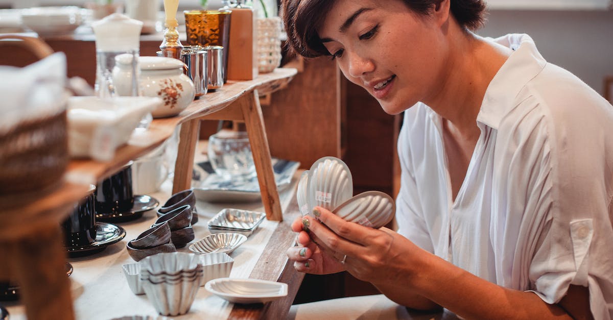 Can you still get item drops by watching livestreams? - Crop Asian shopper watching pastry molds in store Can you still get item drops by watching livestreams? - Crop Asian shopper watching pastry molds in store