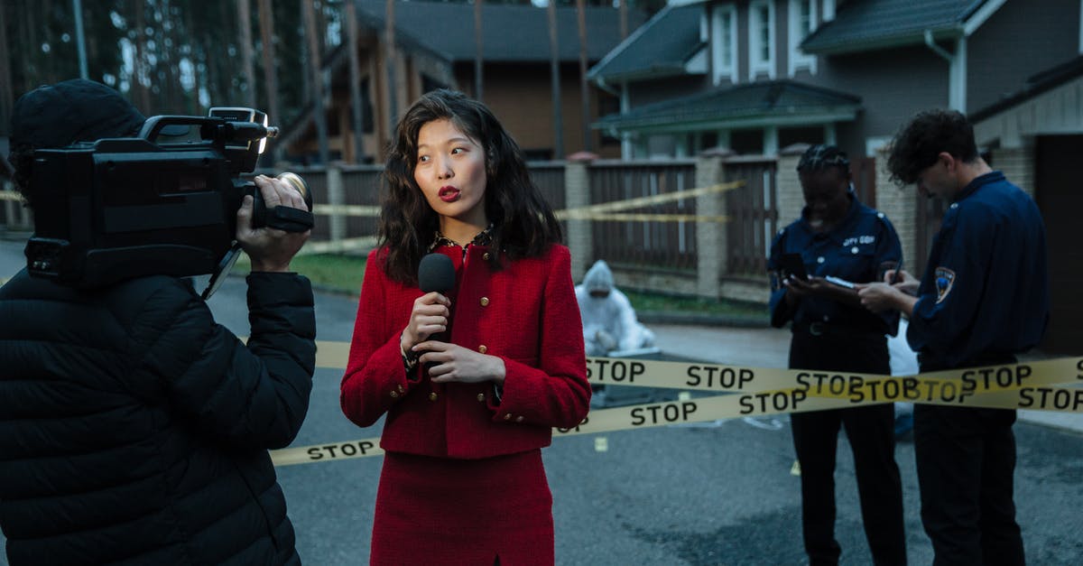 Can you stop the cops appearing in payday 2 [duplicate] - A Group of People Working in a Crime Scene