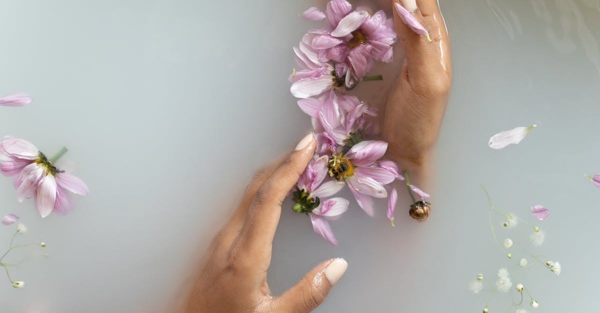 Can you take a catapult on the boat? - Woman holding flowers in hands in water