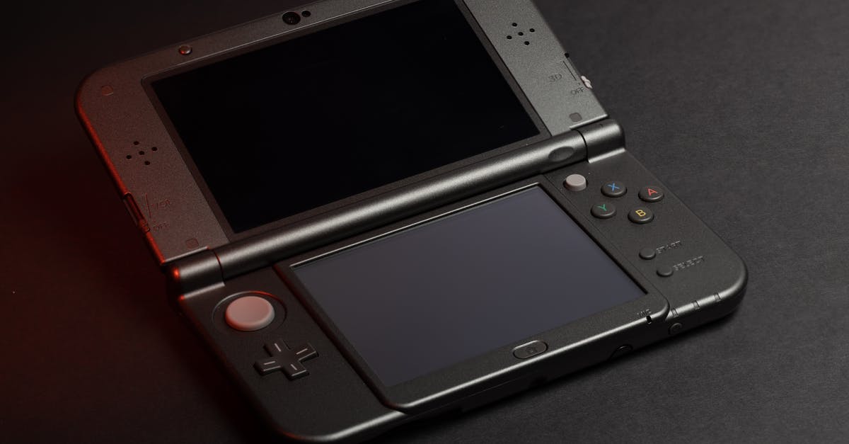 Can you trade Pokemon between a Gameboy Advance and a Nintendo 3DS? - Black Nintendo Game Boy on Black Textile