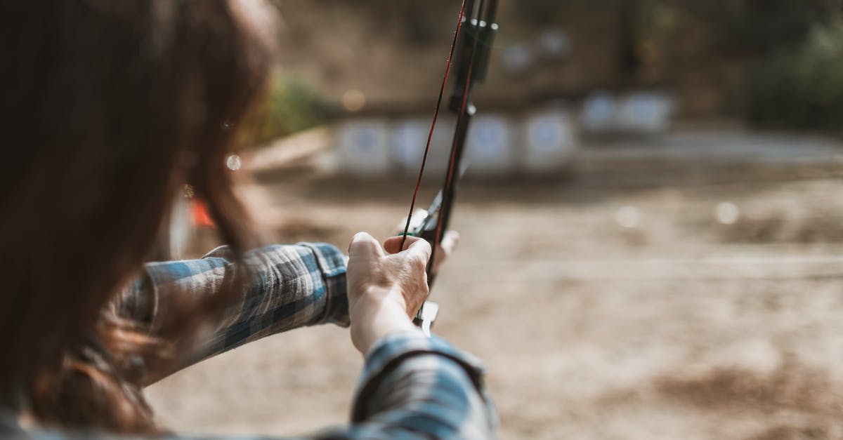 Can you use a bow to shoot specific arrows? (1.8.9) - Woman Holding a Bow and Arrow Can you use a bow to shoot specific arrows? (1.8.9) - Woman Holding a Bow and Arrow